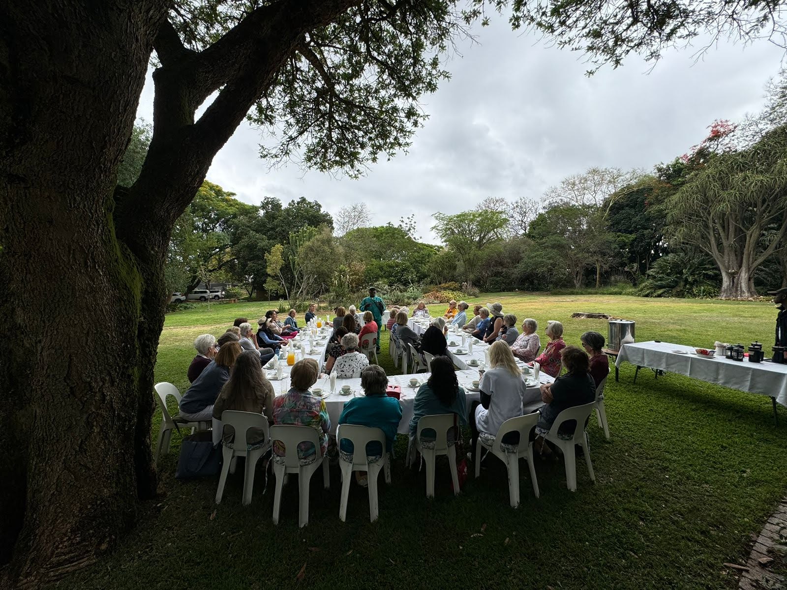Country Garden Club members gathered outdoors